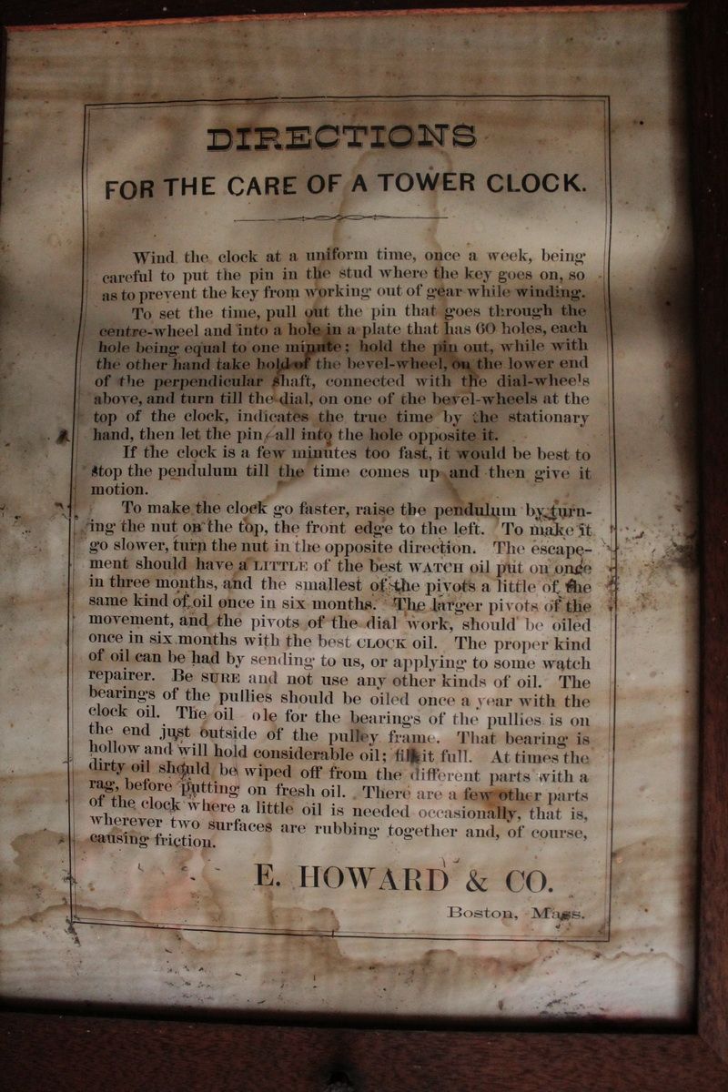 The framed 1884 card headed 'Directions for the Care of a Tower Clock', printed by E. Howard & Co. of Boston, Mass.
